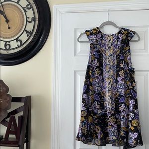 A new medium Free People dark combo dress.☘️☘️